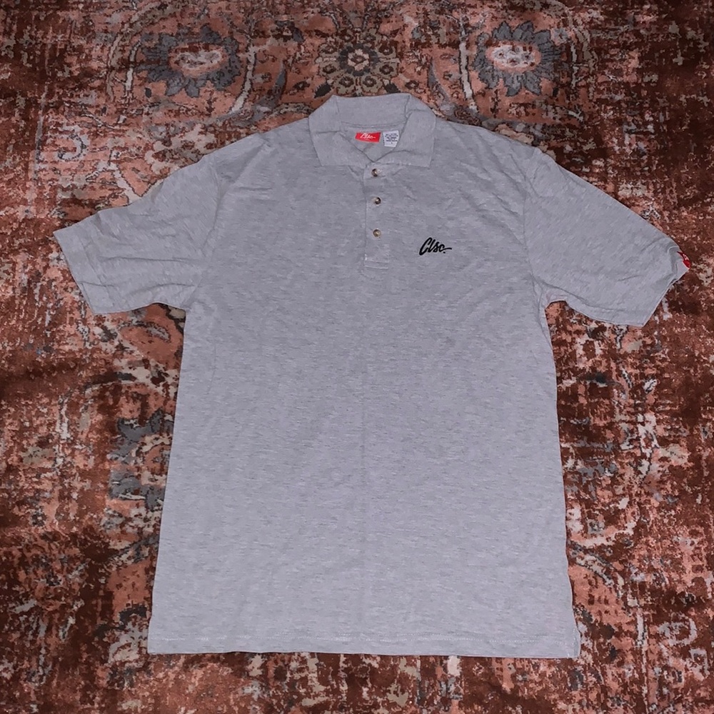 Grey polo from the brand Clsc. Size Large